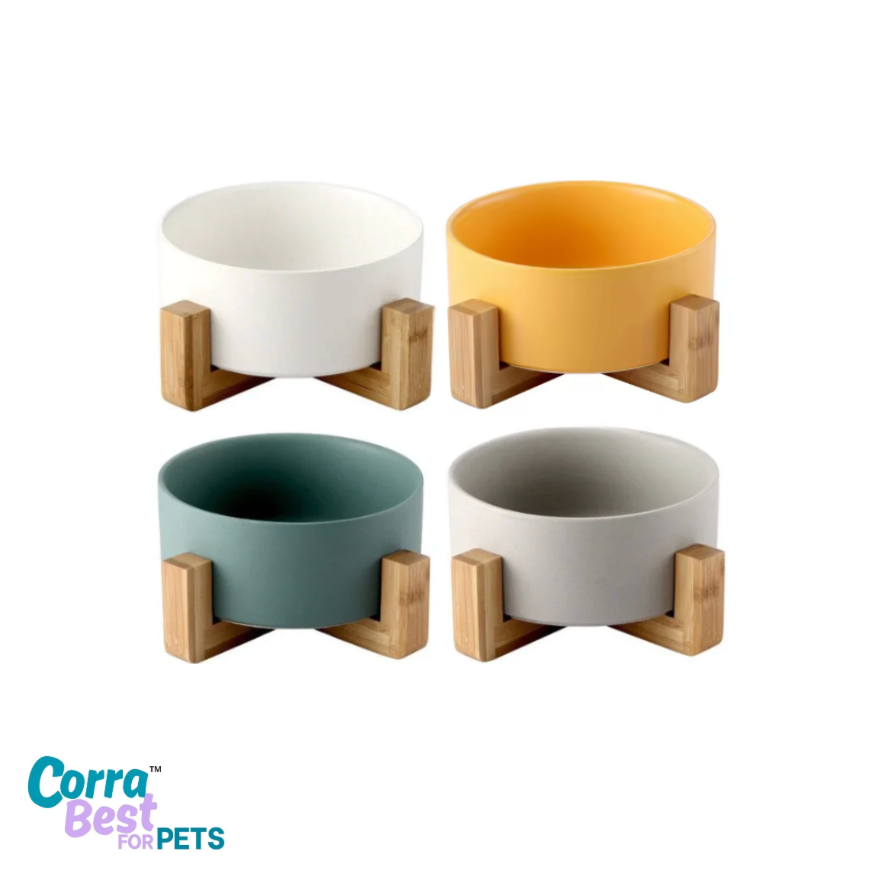 Four pet bowls with wooden stands on a white background, featuring the brand 'Corra Best for Pets'.