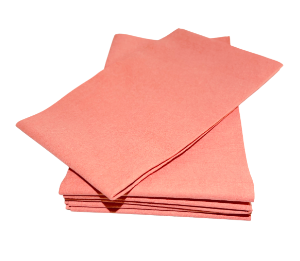 Stack of orange cleaning cloths on a white background