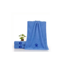 Set of blue towels with paw prints on a white background
