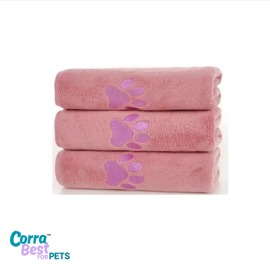 Three pink towels with purple paw prints stacked on a white background, featuring the 'Corra Best for Pets' logo.