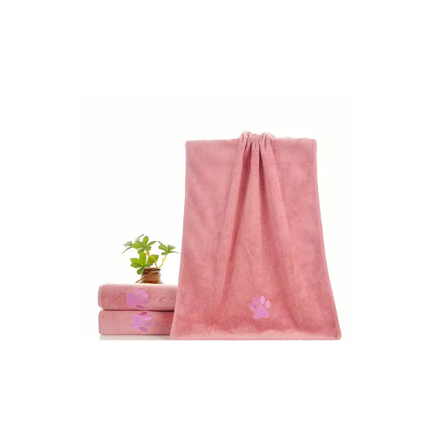 Set of pink towels with paw prints on a white background